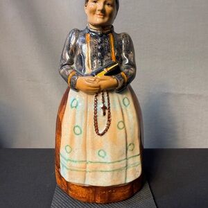 Vintage west German ceramic women Figurine with bible and Rosary liquor bottle